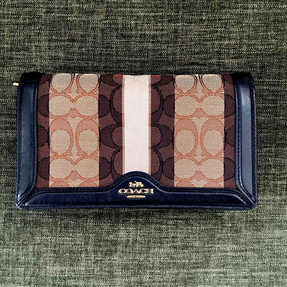 Coach crossbody in signature logo with stripe